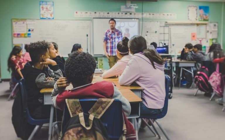 Photograph of children in a classroom.